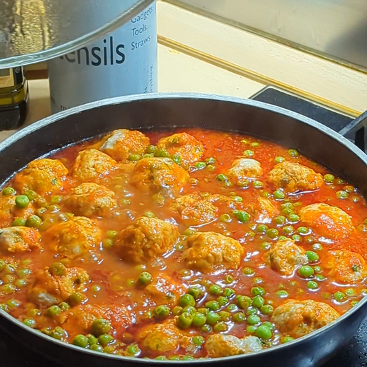 Chicken Meatballs with Green Peas in Tomato Sauce
